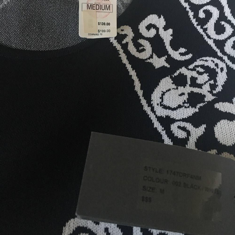 A  unused dress size m  sutible for size 4-6